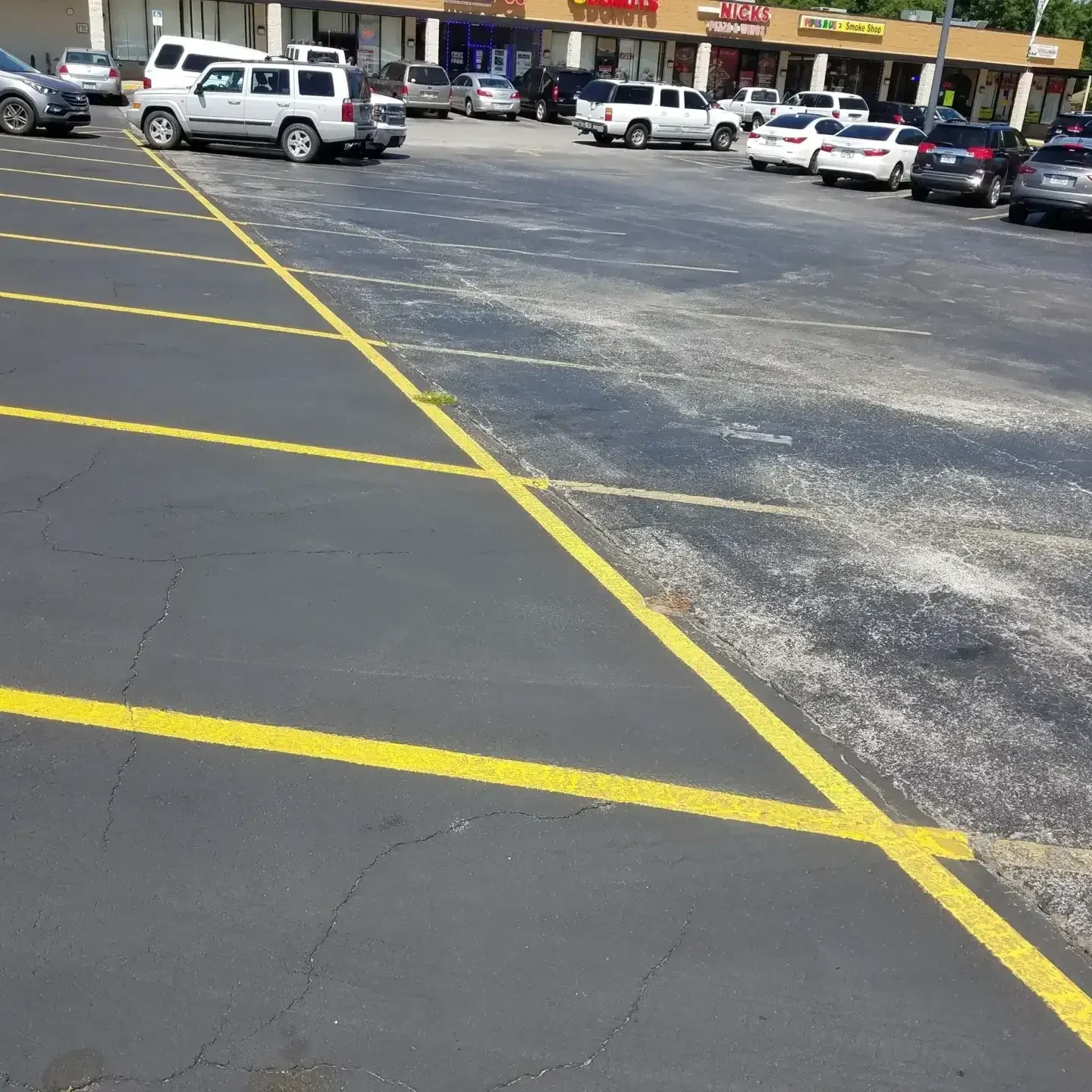Expert team performing parking lot striping in Orlando, FL.